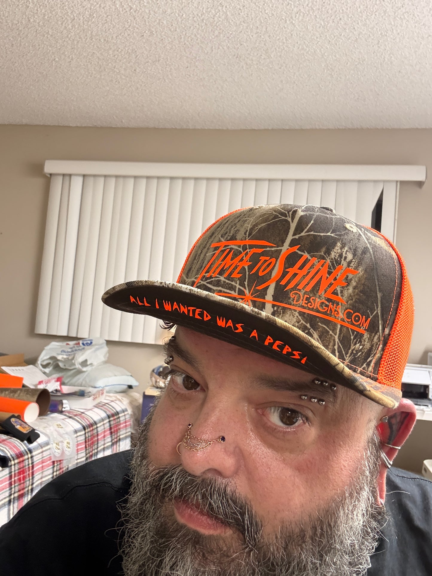 Camo/safety logo Trucker hat