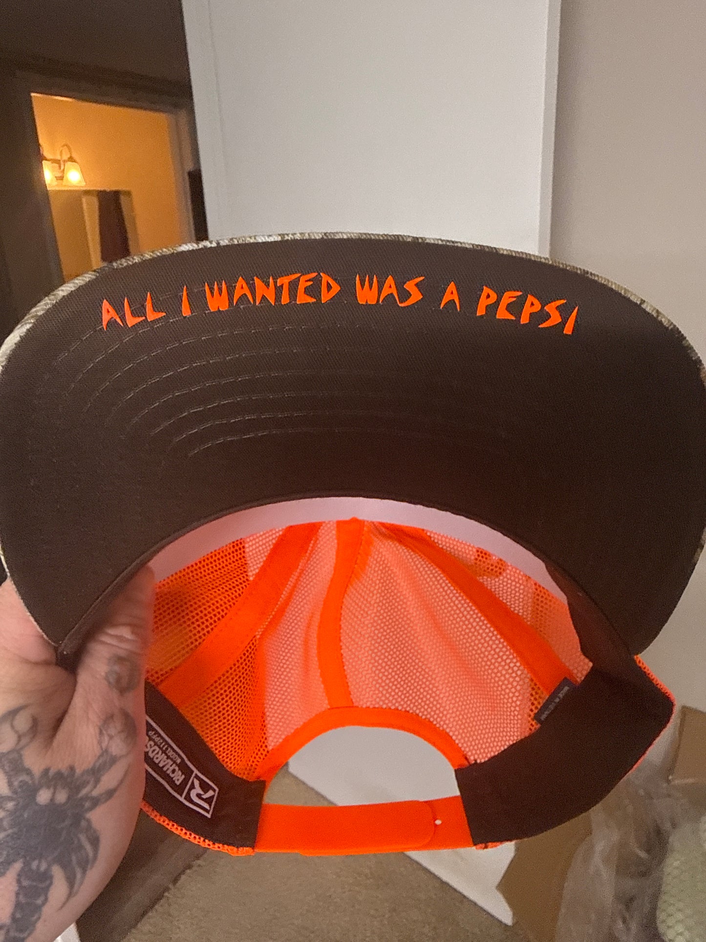 Camo/safety logo Trucker hat