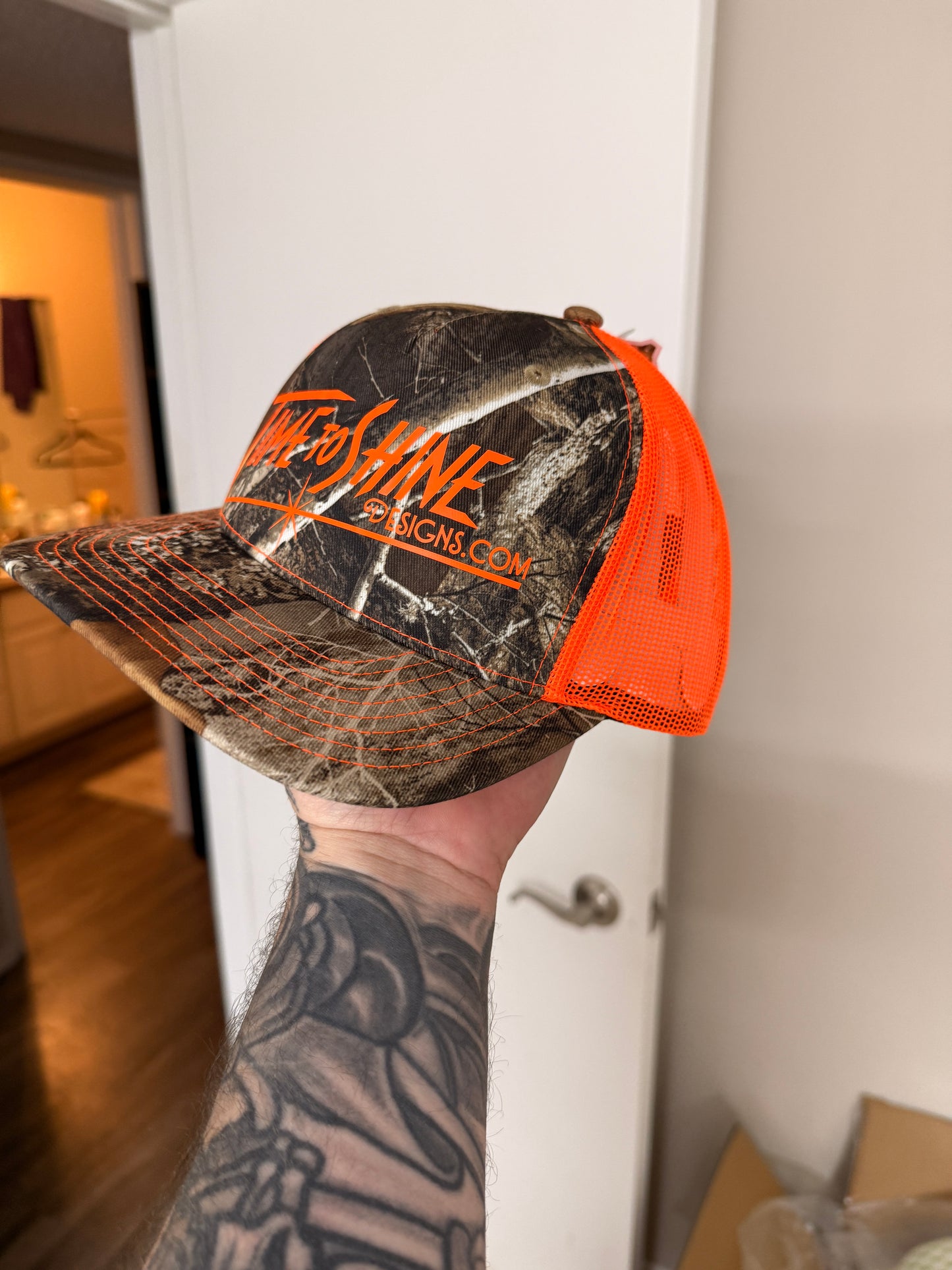 Camo/safety logo Trucker hat